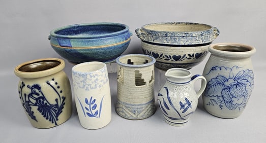 7 Assorted Blue Pottery Pieces Pieces measure between 5-6 inches tall. Chip to one pitcher handle.