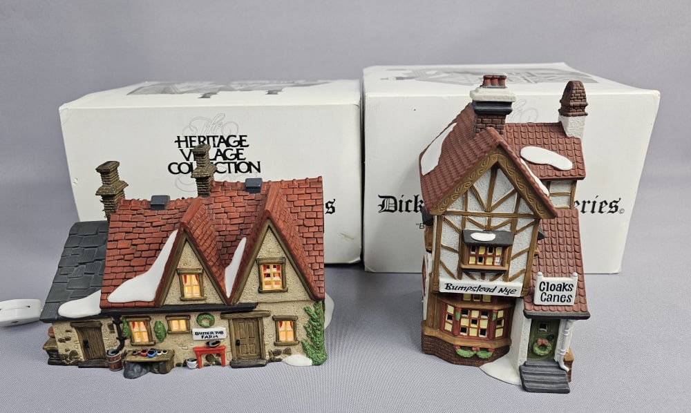 Department 56 Heritage Village Collection Dickens Village Series Butter Tub Farmhouse & Bumpstead: Village Series Butter Tub Farmhouse & Bumpstead NYE Cloaks & Canes with Boxes Second piece with paint chip to corner. Overall good condition.