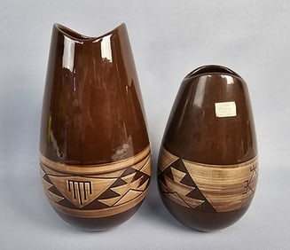Pair of Native American Sioux Pottery Vases A pair of Native American Sioux Pottery vases, signed by