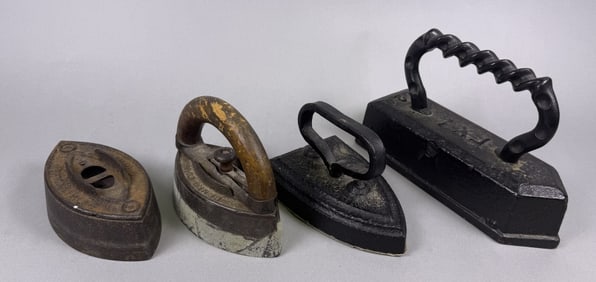 Antique Cast Iron Clothes Irons x4 Duct tape covering bottom of one. Duct tape residue on another.