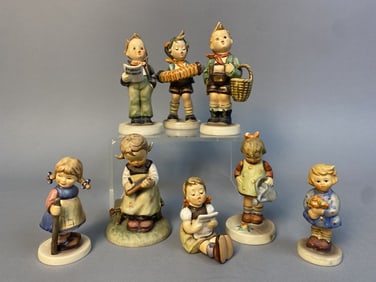 Eight Hummel Figurines Includes: Pixie; Girl With Sheet of Music; Girl With Flowers; Little Gardener