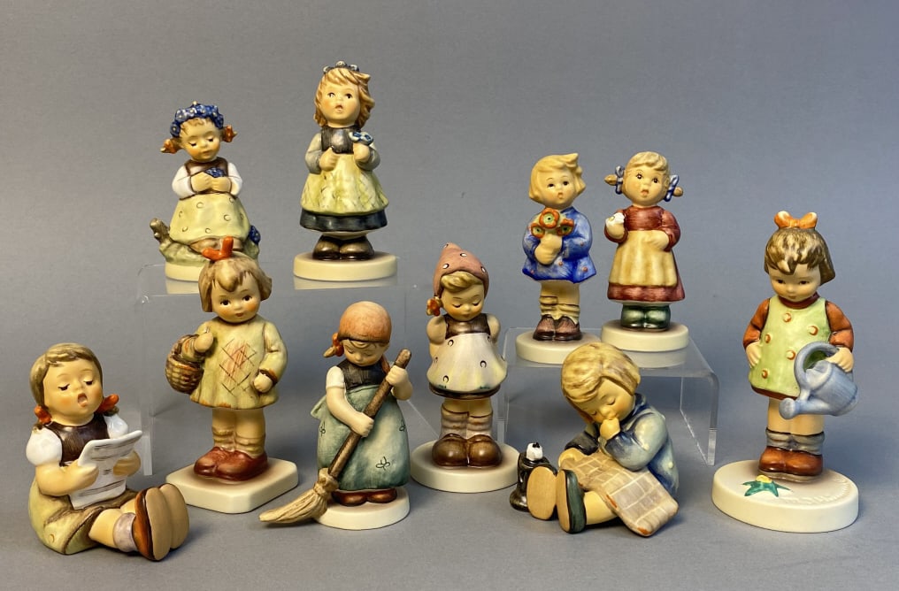 Ten Hummel Figurines Includes: Girl With Flowers; Girl With Sheet of Music; The Botanist or Gentian: Includes: Girl With Flowers; Girl With Sheet of Music; The Botanist or Gentian Girl; A Nap; Little Sweeper; First Bloom or On The Mountain I Was; I Brought You A Gift, part of M.I. Hummel Club; From T