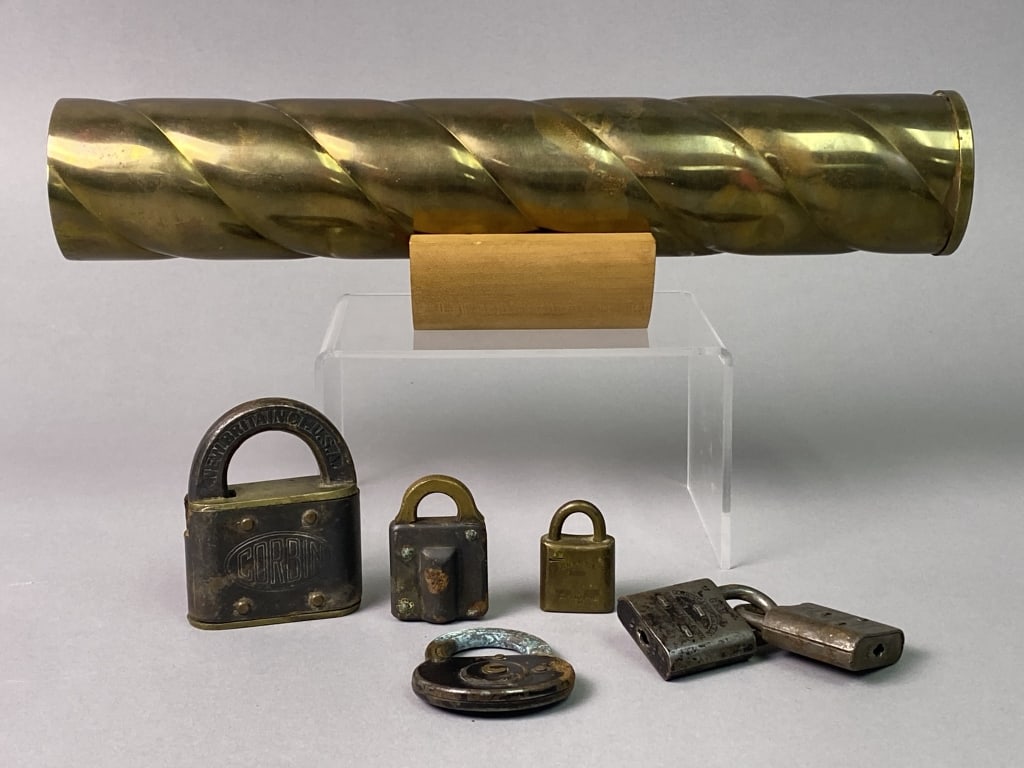 Brass Kaleidoscope and Locks Vintage brass kaleidoscope measures 11 inches long and includes wooden: Vintage brass kaleidoscope measures 11 inches long and includes wooden display. Appears to be missing end cap which would have held crushed glass or seed beads. Mirrors and eyepiece still intact, work