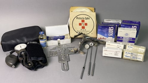 Group of Vintage Medical Items Includes: Blood pressure cuff in original case; thermometers; partial