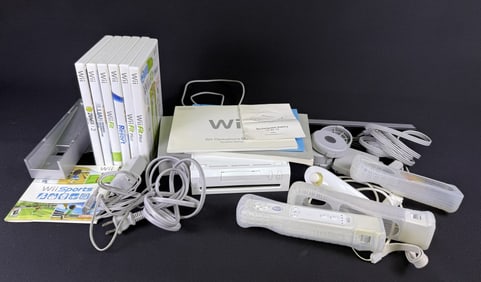 Nintendo Wii Fit Console Games Bundle Includes items shown in photographs. Powers on otherwise