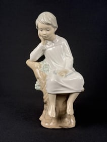 Lladro Porcelain Figurine 4876 Little Boy Thinking 8.5 inches tall, 4 inches wide.