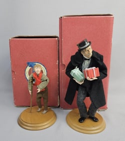 A Pair of Hallmark 'A Christmas Carol' Figurines A pair of Hallmark 'A Christmas Carol' figurines,