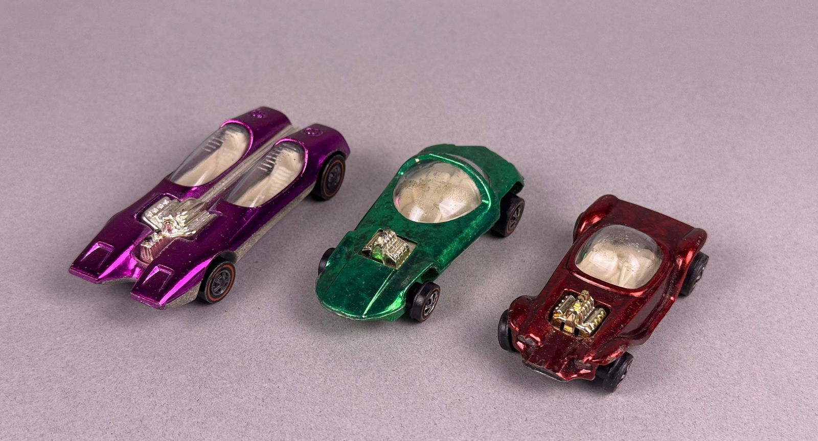Three Mattel Hot Wheels Redline Die-Cast Cars: 'Splittin' Image', 'Beatnik Bandit', and (1 of 8)