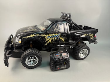 A New Bright Ford F-150 Thunder 4X4 Radio-Controlled Truck with Controller and Battery