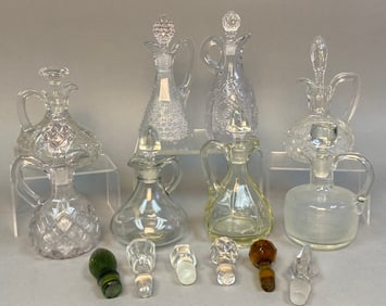 A Collection of Assorted Glass Cruets and Stoppers