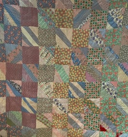A Pair of Vintage Patchwork Quilts, circa 1930s-1950s, including a 'Trip Around the World' Pattern
