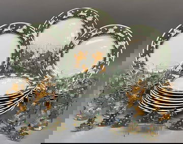 A Collection of Sango White Woods Christmas Dinnerware, Glass Tumblers, and Metal Napkin Rings