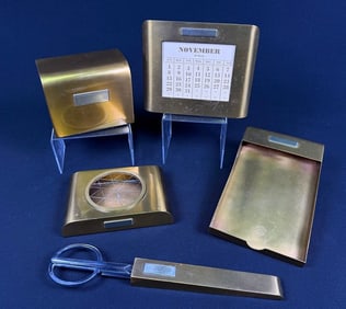 A Mid-20th Century Silver Crest Bronze Desk Set, including a Perpetual Calendar