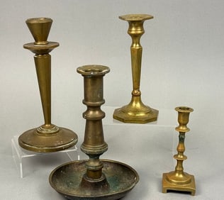 A Group of Four Brass Candlesticks