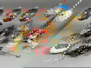 A Collection of Decorative Christmas Ornaments and Related Items, including a Venetian Jester Mask