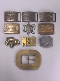 A Collection of Nine Diverse Vintage and Commemorative Belt Buckles