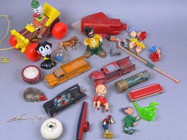 A Group of Vintage Plastic, Tin, and Die-Cast Toys, Mid-20th Century