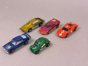A Group of Six Hot Wheels Redline Die-Cast Cars, including Two Sizzlers 'Revvin' Heaven'