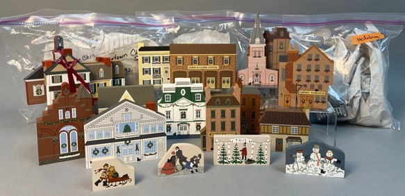 A Collection of The Cat's Meow Village Christmas Series Wooden Collectibles