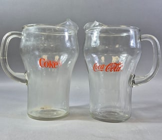 A Pair of Vintage Coca-Cola and Coke Heavy Clear Glass Pitchers