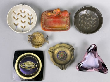 A Collection of Seven Vintage and Mid-Century Ashtrays and Decorative Trays