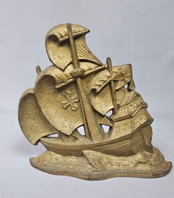 A Vintage Gilt Cast Iron Galleon Ship Doorstop