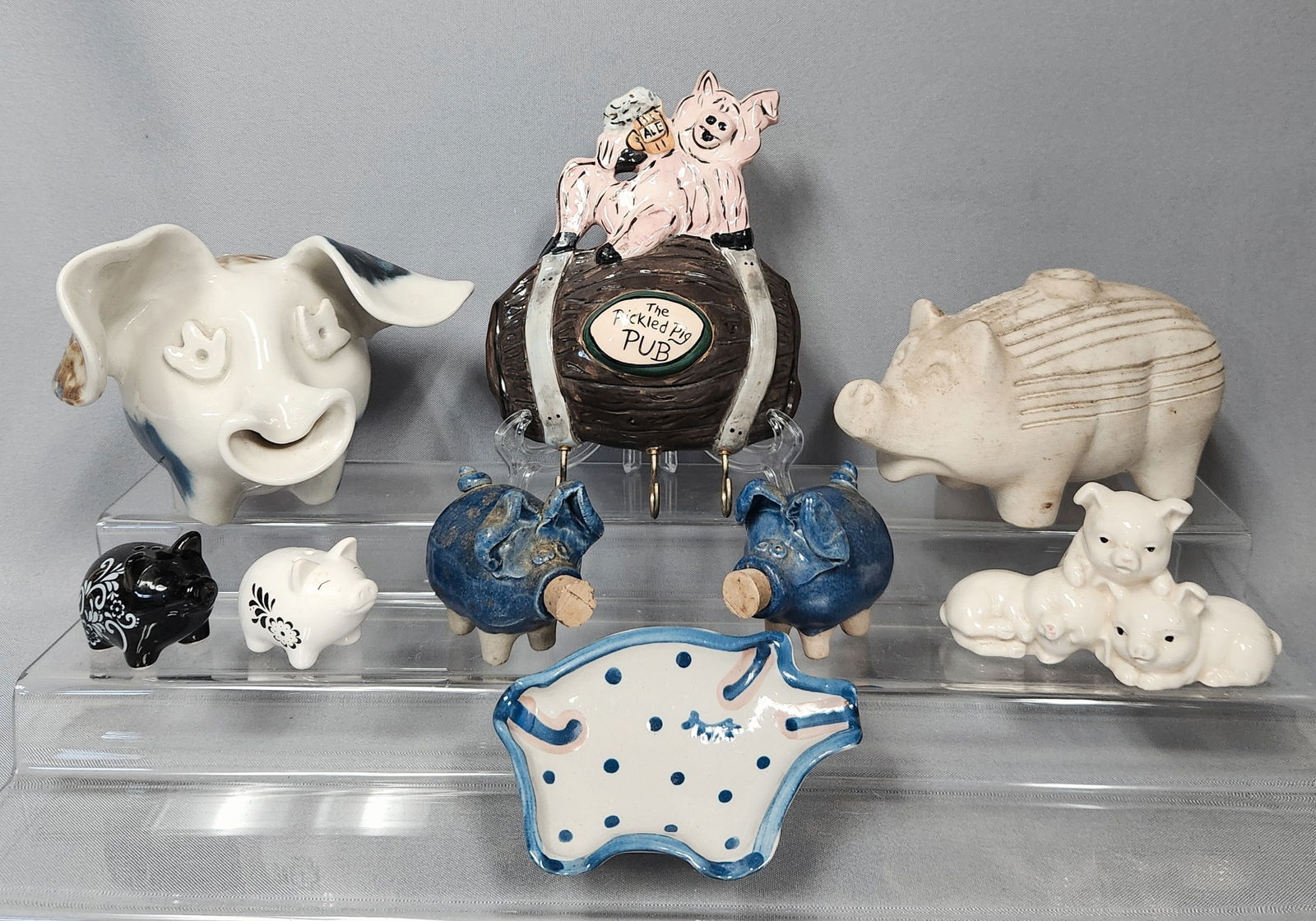 A Collection of Ten Pig-Themed Ceramic Items, including a Blue Sky Clayworks 'The Pickled Pig Pub' (1 of 20)