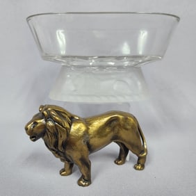 A Solid Brass Lion Figurine and a Frosted Glass Pedestal Dish