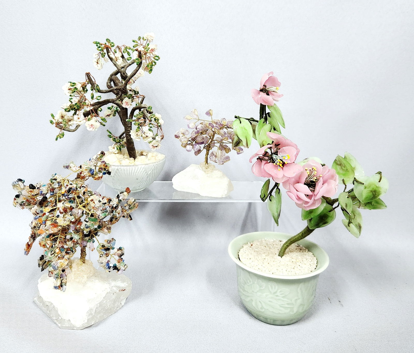 A Group of Four Decorative Miniature Trees, including a Chinese Jade Glass Pink Flowering Bonsai (1 of 11)