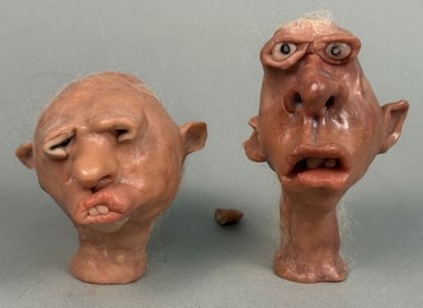 A Pair of Contemporary Grotesque Polymer Clay Heads