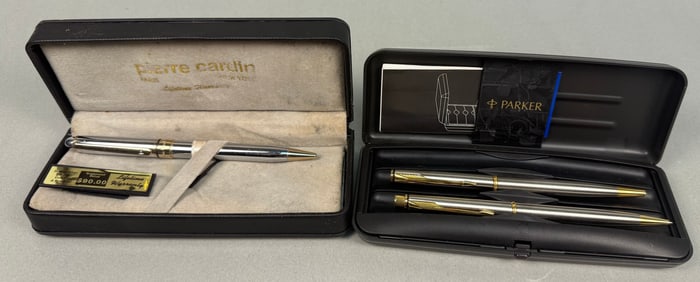 A Parker Insignia Stainless Steel Ballpoint Pen & Pencil Set and a Pierre Cardin Sterling Silver &