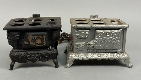 A Pair of Antique Cast Iron Miniature Toy Stoves, 'Eagle' and 'Crescent', likely Salesman Samples