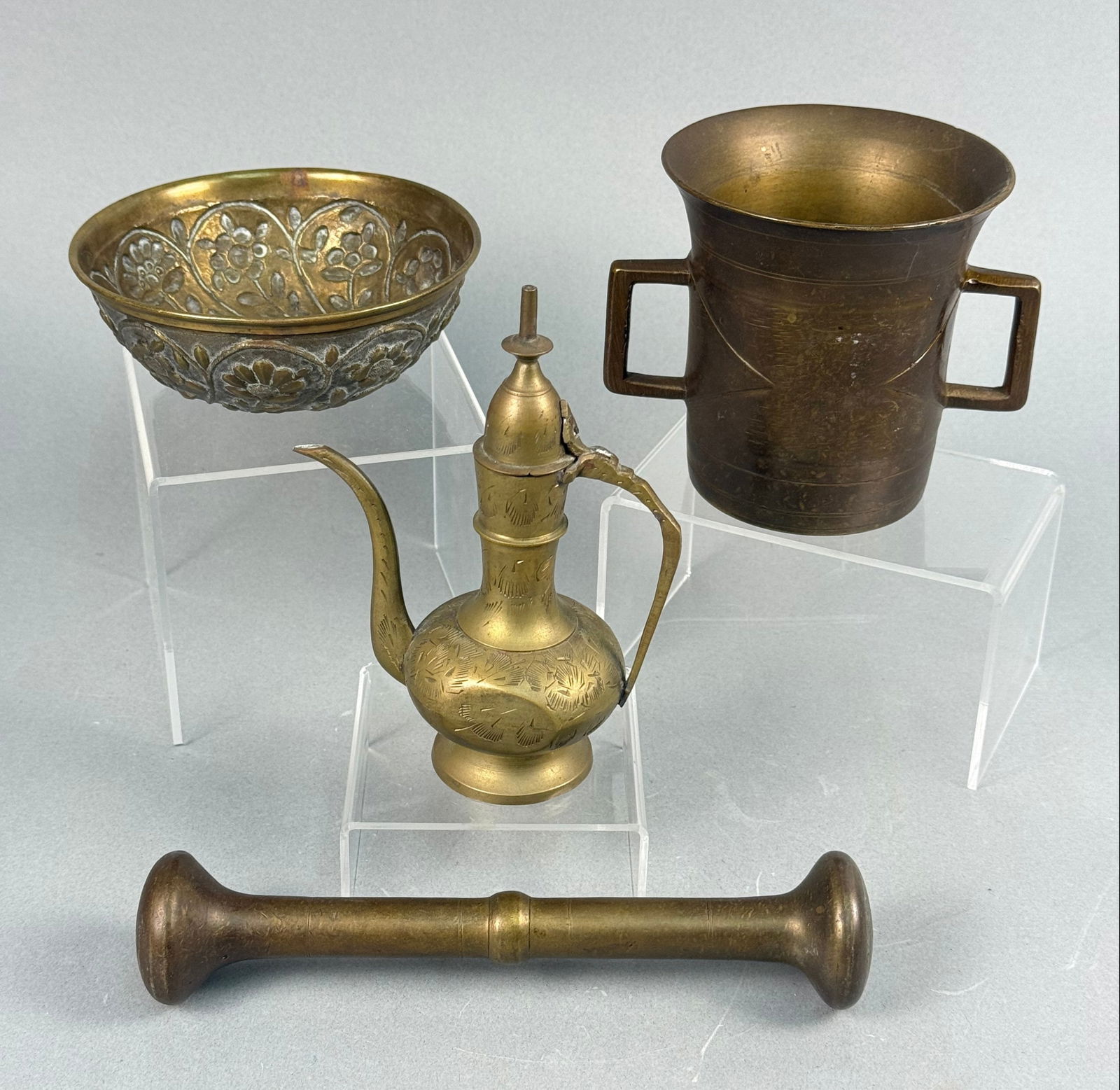 A Collection of Metalware, including an Indian Etched Brass Teapot/Oil Decanter, a Mortar and (1 of 8)