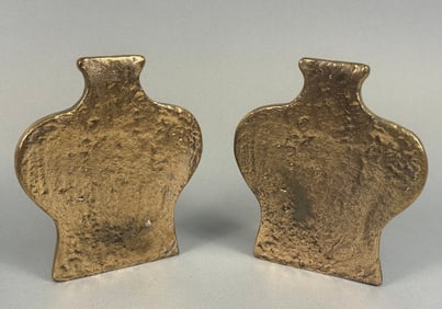 A Pair of Gilt and Patinated Cast Metal Vase-Form Bookends