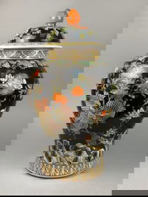 A Maitland-Smith Ltd. Famille Noire Porcelain Ginger Jar with Peacock and Floral Decoration