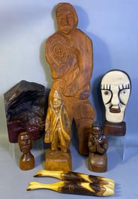 A Group of Hand-Carved Folk Art Wood Sculptures, including a Caron Trapper Figure
