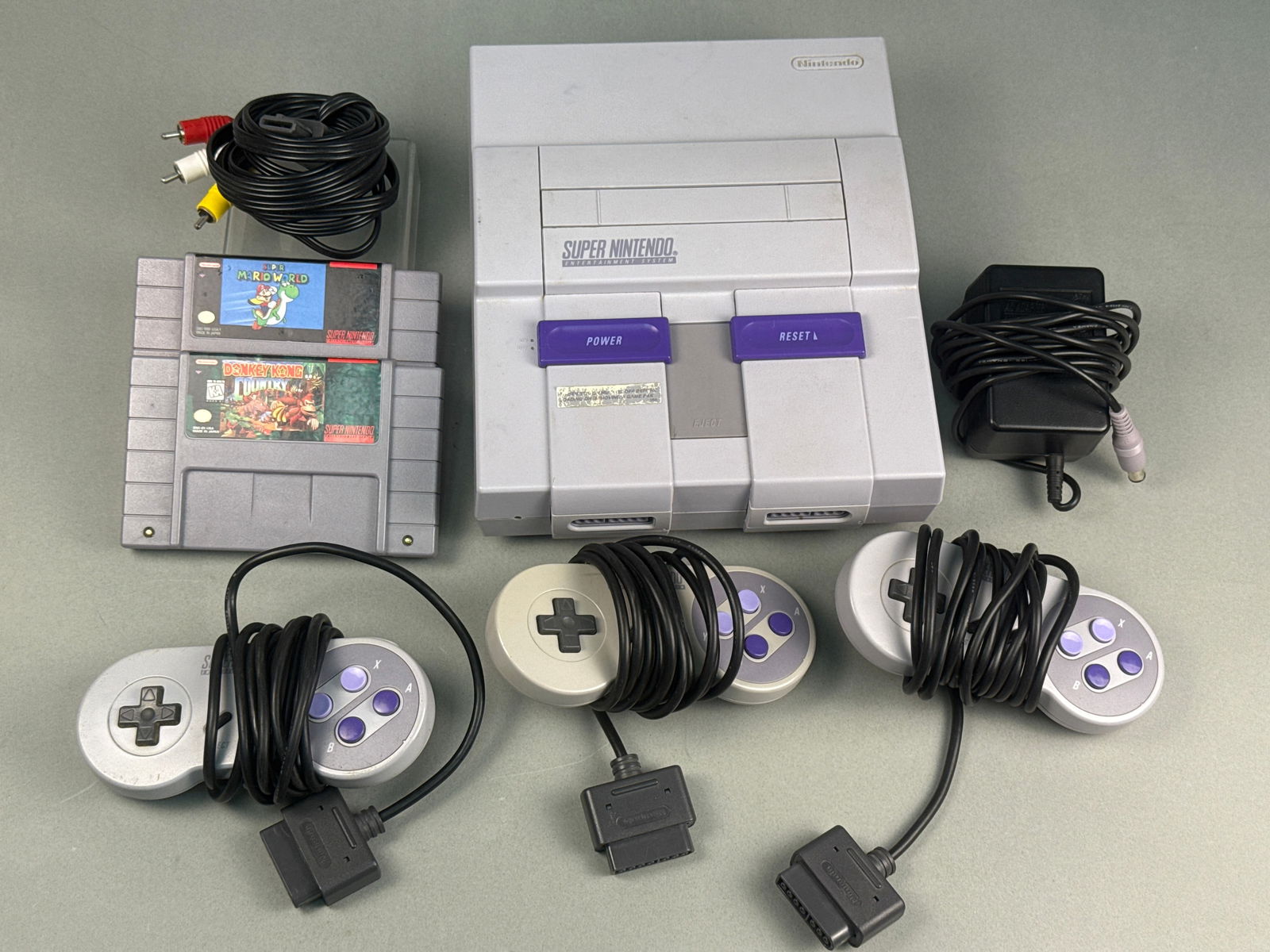 Super Nintendo Entertainment System (SNES) Console with Three Controllers and Two Games (1 of 9)
