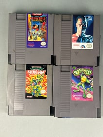 A Group of Four Nintendo Entertainment System (NES) Cartridges, including Teenage Mutant Ninja