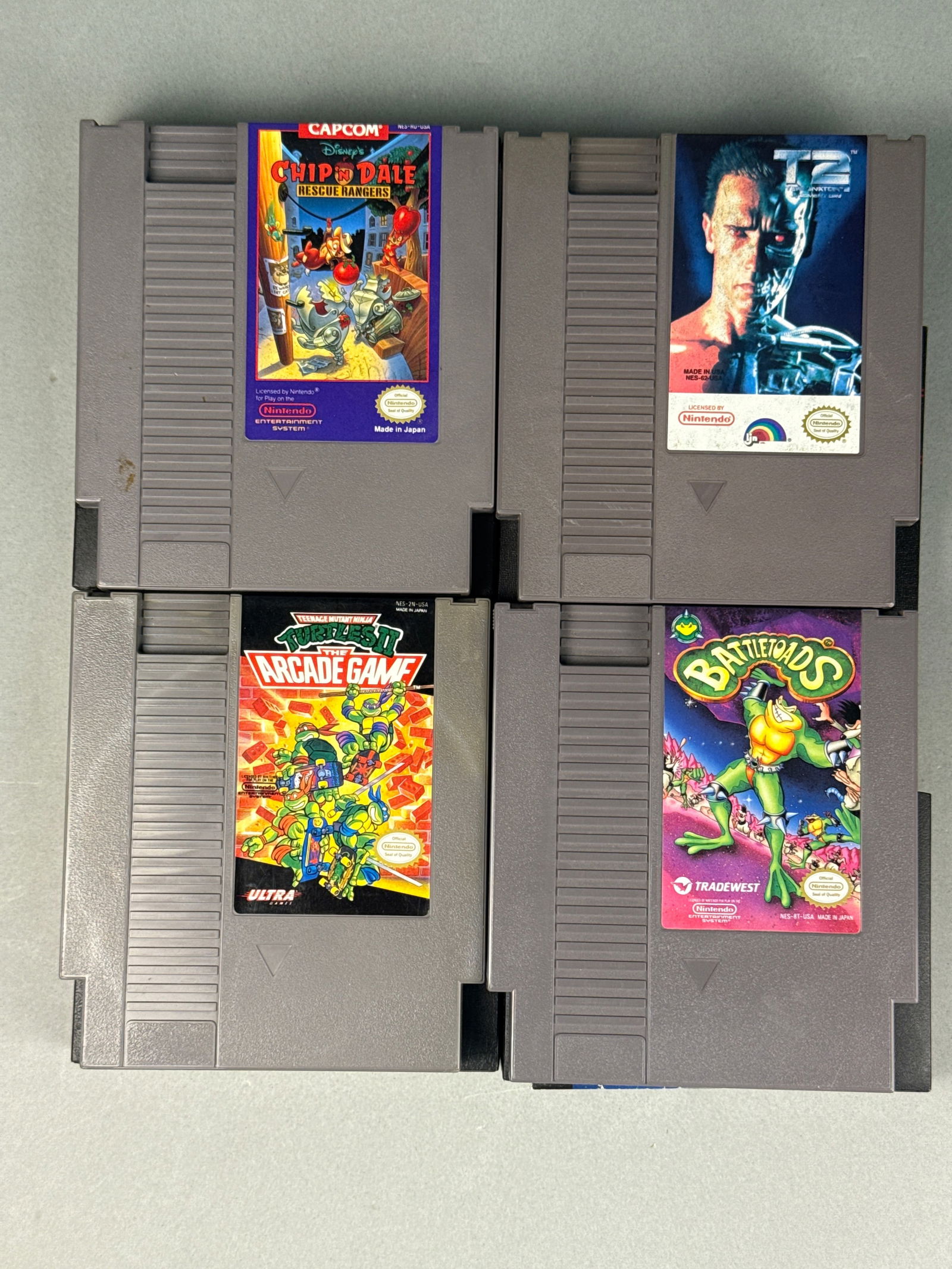 A Group of Four Nintendo Entertainment System (NES) Cartridges, including Teenage Mutant Ninja (1 of 8)