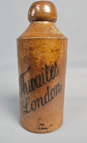 A Thwaites London Stoneware Beer Bottle