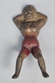 A Naughty Nellie Cast Iron Boot Jack