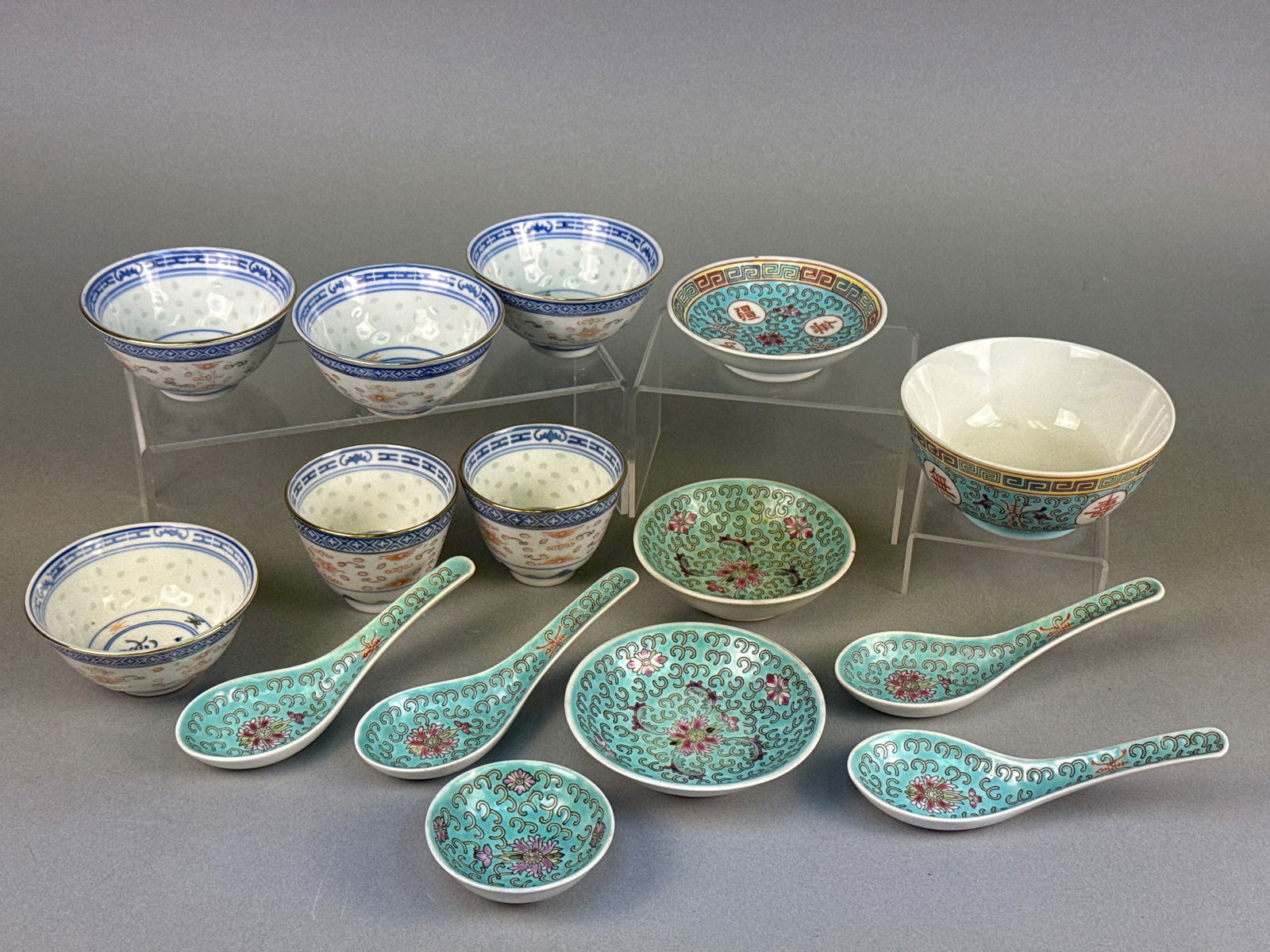 A Collection of Twenty-Three Chinese Famille Rose 'Mun Shou' Longevity Porcelain Bowls and Spoons (1 of 7)