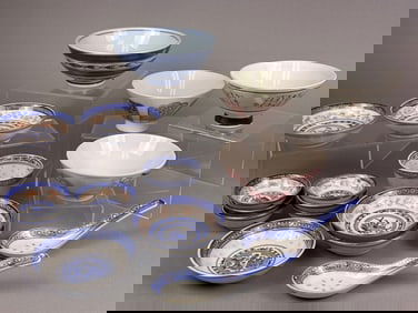 A Collection of Approximately Twenty-Two Chinese Ceramic Bowls and Spoons, Featuring Rice Grain and