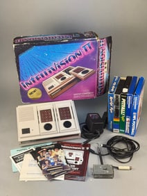 A Mattel Electronics Intellivision II Home Video Game Console with a Collection of Five Boxed Games