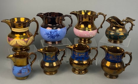 A Collection of Eight Antique English Copper Lustreware Pitchers and Creamers