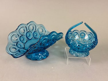 A Pair of L.E. Smith Moon and Stars Blue Pressed Glass Banana Boat Fruit Dish and Basket