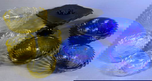 A Collection of Pressed Glass Serving and Individual Dishes