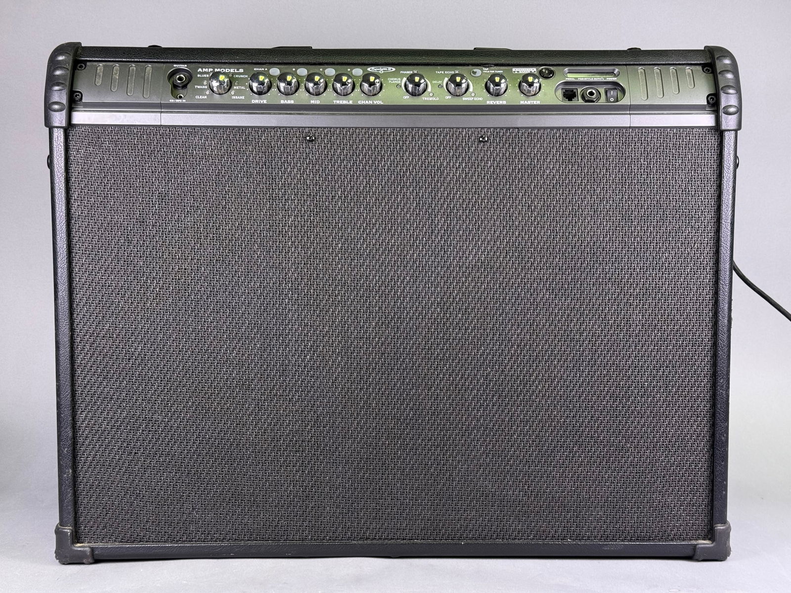 Line 6 Spider III 150 2x12 150W Stereo Guitar Combo Amplifier: A Line 6 Spider III 150 2x12 150W Stereo Guitar Combo Amplifier. This solid-state modeling combo amplifier features a black Tolex-covered cabinet with plastic corner protectors, a top-mounted carrying