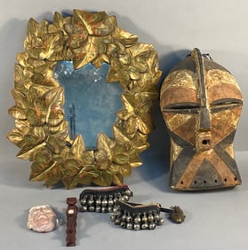 A Collection of Decorative and Ethnographic-Style Items, including a Carved Wood Foliate Mirror
