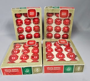 A Group of Shiny Brite Red Glass Christmas Ornaments